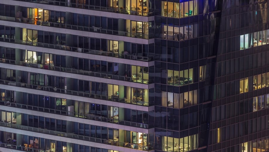 Windows,Lights,In,Modern,Office,And,Residential,Buildings,Timelapse,At